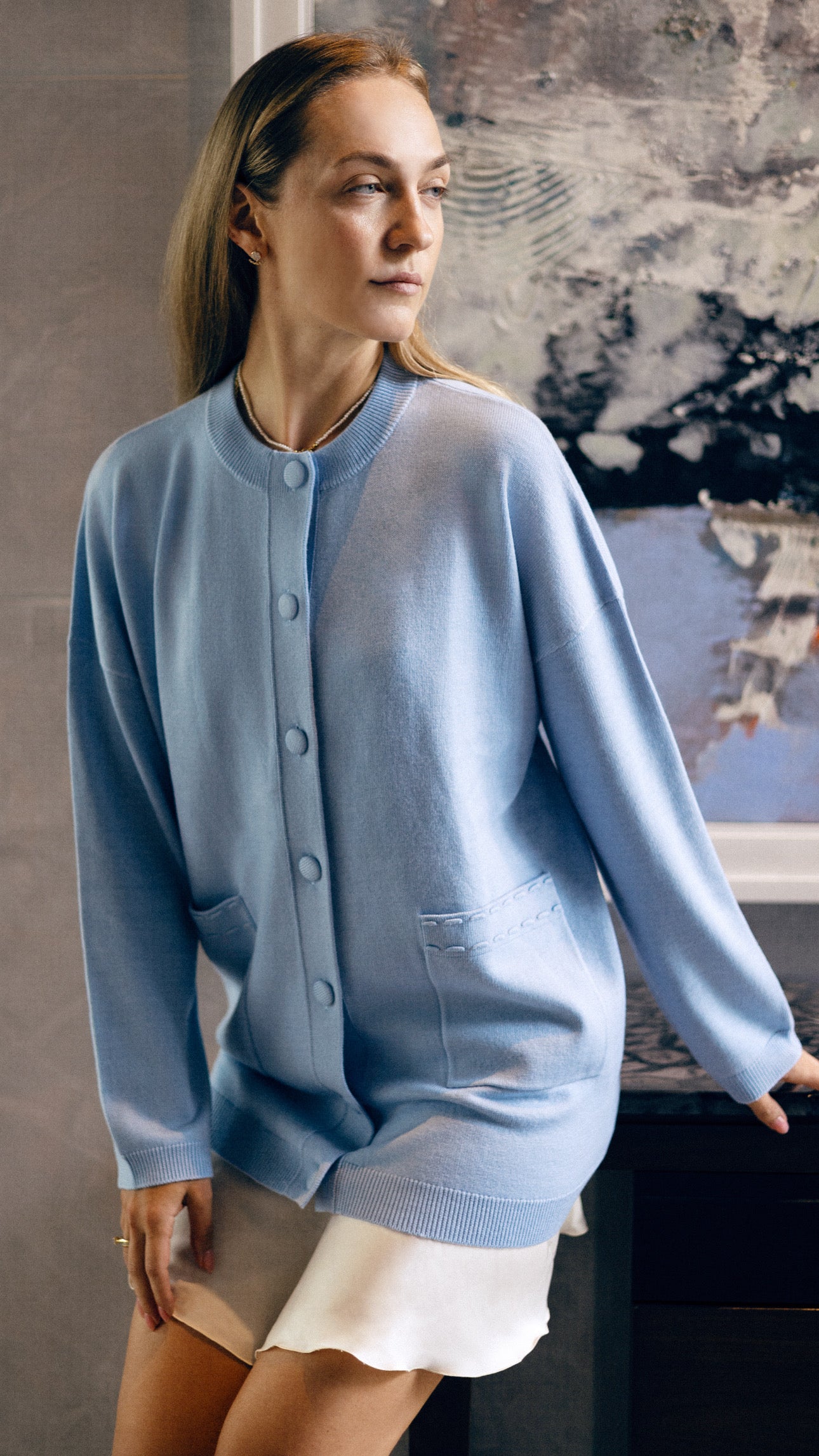 Crafted from a smooth fine-knit fabric, it gently drapes over the body while maintaining a clean, structured line. Fast delivery to Singapore and Dubai.