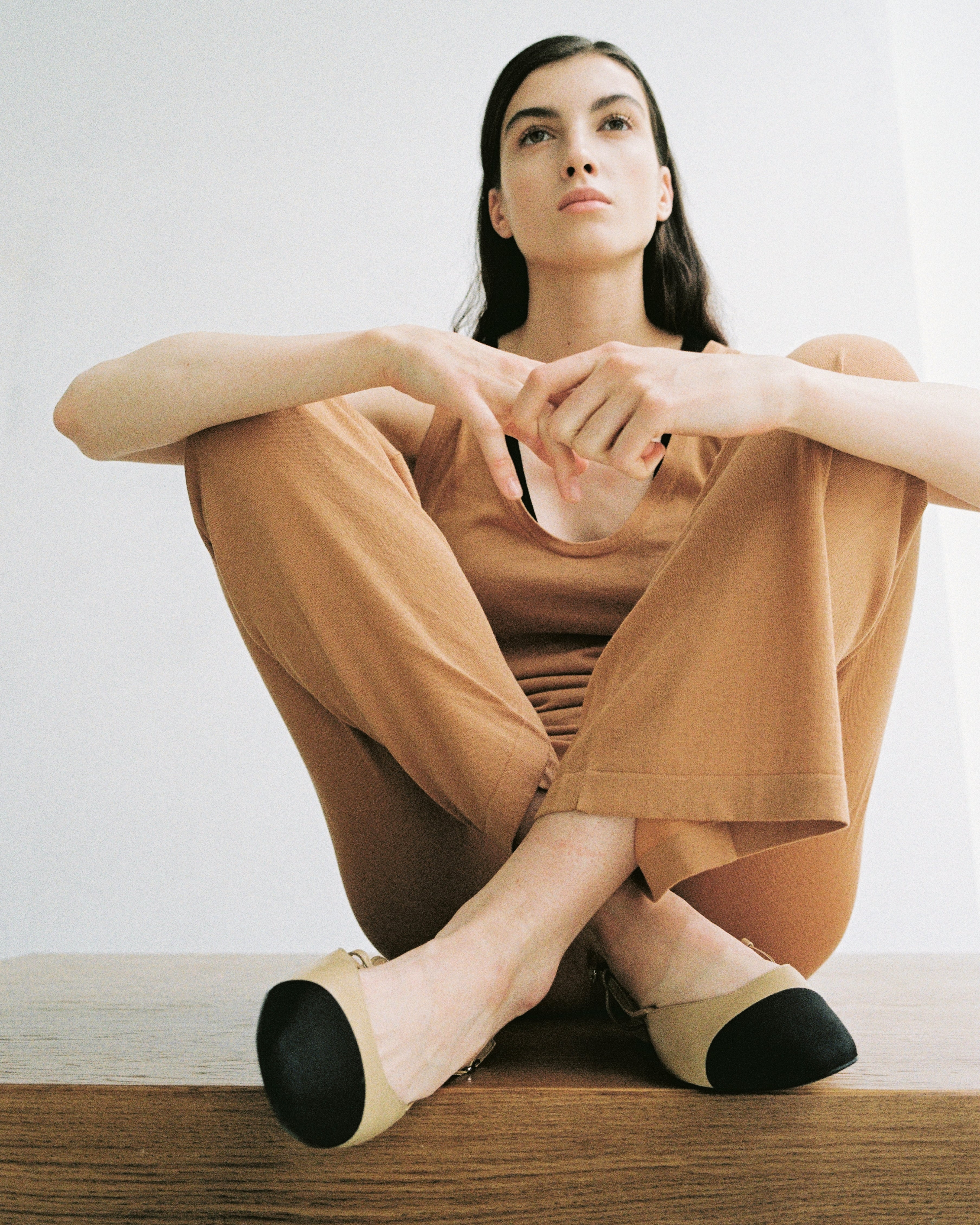 The fabric feels smooth, breathable, and delicate against the skin — light enough for warm climates, yet polished enough for city dressing. The warm caramel tone adds understated luxury and pairs beautifully with neutral accessories, soft leather, and minimalist jewelry.